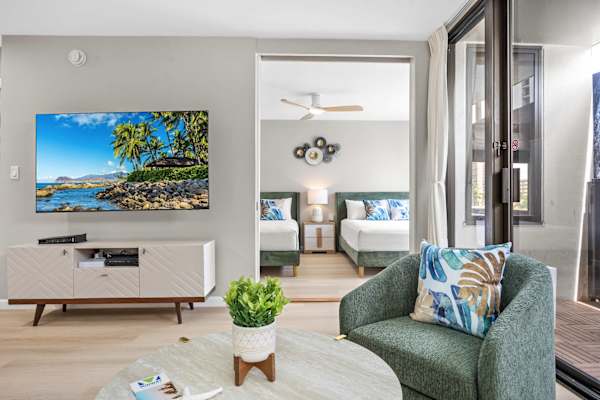 Watch your favorite shows from your 65" Smart TV in the living room