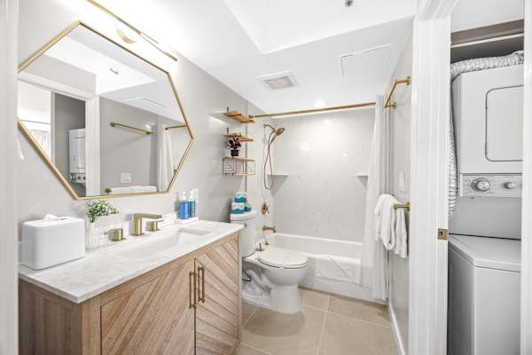 Full bathroom with tub and shower combination
