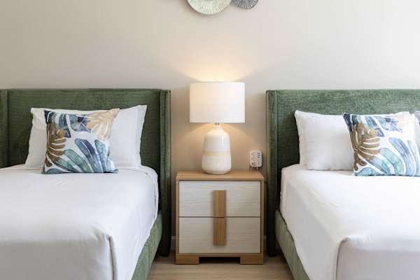 Bedroom with queen-sized and twin-sized beds