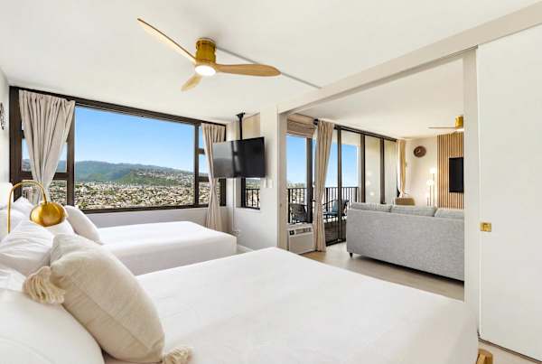 Great mountain views from your bedroom with 2 queen beds, 50" smart TV, and ceiling fan.