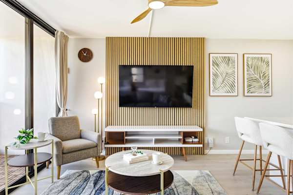 Enjoy your favorite shows from your living area with a 65" Roku smart & cable TV!