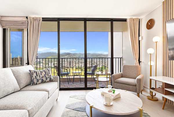 Your living area has a pull-out sleeper sofa plus great mountain views from your floor-to-ceiling glass window.