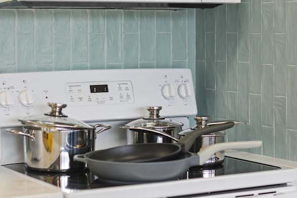 Pots and pans available in the kitchen