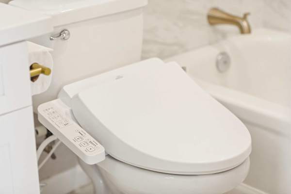 Experience elevated comfort and modern luxury with a premium electronic bidet seat, seamlessly integrated for a spa-like bathroom upgrade.