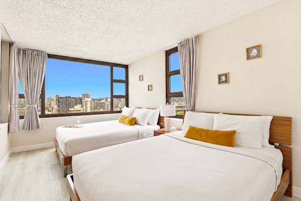 Have a restful night's sleep in your bedroom with 2 queen beds