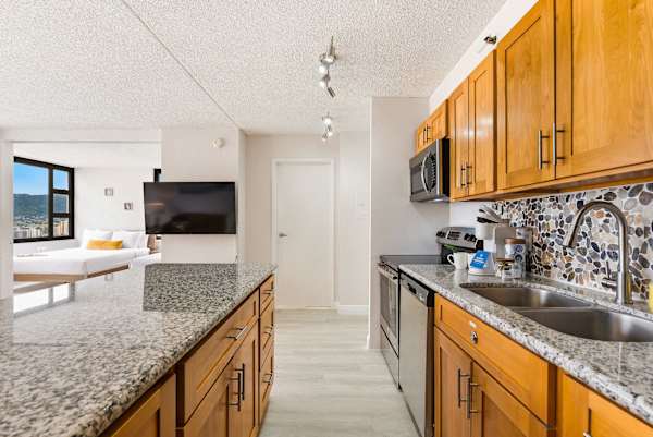 Designed for effortless meal prep and entertaining, this modern kitchen keeps you connected to the entire living space.