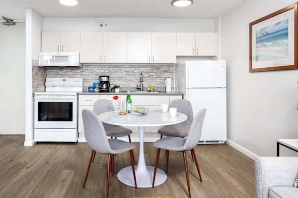 Prepare delicious meals in your fully-equipped kitchen and dine together at your dining table with 4 chairs.