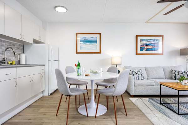 Dine comfortably at the intimate round table with four chairs—perfect for cozy breakfasts, casual meals, or small gatherings.