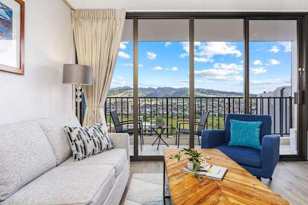 Enjoy a stunning, uninterrupted mountain vista from the living room that provides a serene backdrop and elevates every moment of your stay.