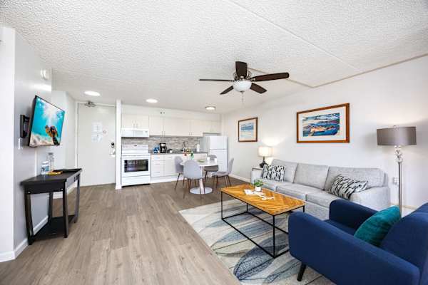 Experience the ultimate in open-concept living in your bright condo that seamlessly blends a modern kitchen, dining area, and cozy lounge.