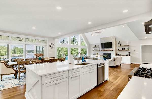 Those lake views from every room! It never gets old! Whether dining at the kitchen island, or on the Restoration Hardware dining table or on the screen porch, party deck or the great room wall of windows - it's big water views - all day long!!