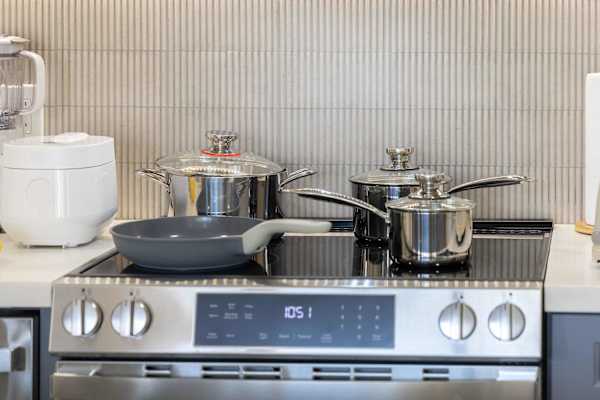 Pots and pans are readily available in the kitchen for your cooking needs
