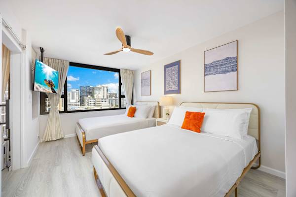 Relax in your bedroom with 2 queen-size beds