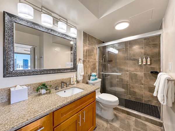 Refresh in your bathroom with a vanity and a walk-in shower