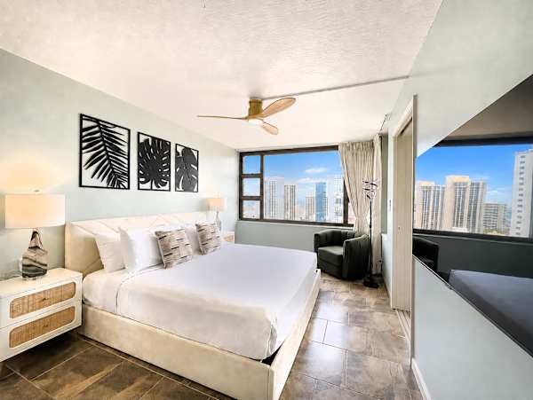 Relax in your bedroom with a king-size bed and a 43" Smart TV