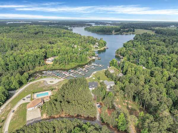 Aerial shot of the community pool/clubhouse with gorgeous lake views and Blueberry Bay right next door. Lake views are everywhere!