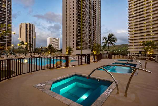 Relaxing hot tubs in the Waikiki Banyan deck.