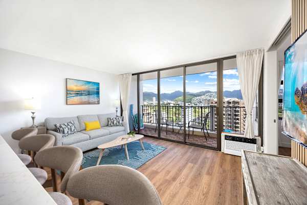 Watch your favorite TV shows in your living area, or relax and enjoy the great mountain views from your floor-to-ceiling glass window