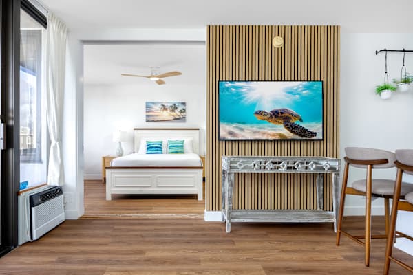Your living area has a 55" smart tv and is separated from your bedroom by a sliding door