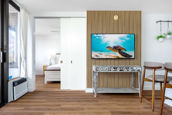 Your living area has a 55" smart tv and is separated from your bedroom by a sliding door