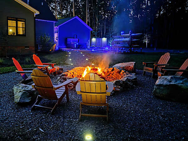 Fire Pit - Gather around the fire as the woods darken, marshmallows and stories at the ready.