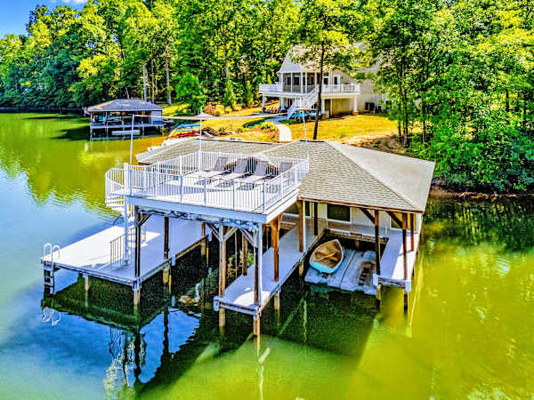Boathouse Sun Deck - Rooftop loungers right over the water, the best seats on the property for sun, swims, and sunset.