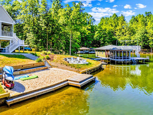 Sandy Beach - Toes in the sand, the fire pit just up the steps, and a kayak ready whenever the mood strikes.