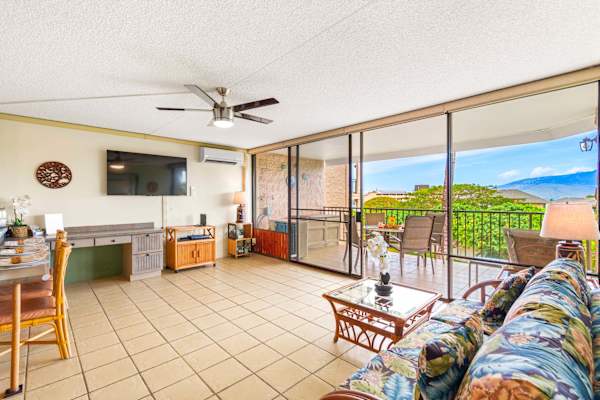 Experience seamless indoor-outdoor living in this bright, open-concept space that flows effortlessly onto a scenic private balcony