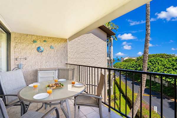 Savor your morning coffee with a side of ocean breezes and tropical views right from your spacious private lanai