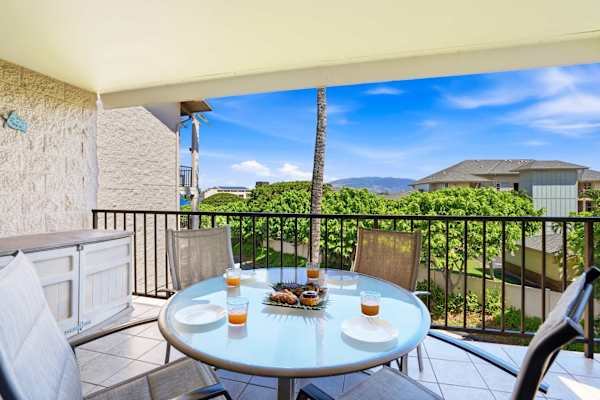 Take in panoramic tropical views and blue skies while dining al fresco on your spacious private balcony