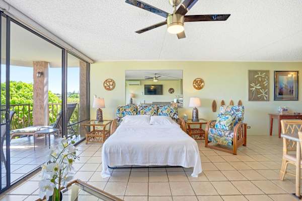 Maximize your space without sacrificing comfort thanks to the convenient sleeper sofa in this open, airy living area