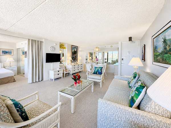 Your living area has a pull-out sleeper sofa, smart TV, coffee table, and direct access to the balcony