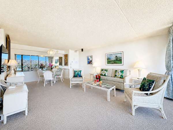 Relax, dine, and entertain effortlessly in your living area featuring a beautiful open layout and inviting tropical vibes