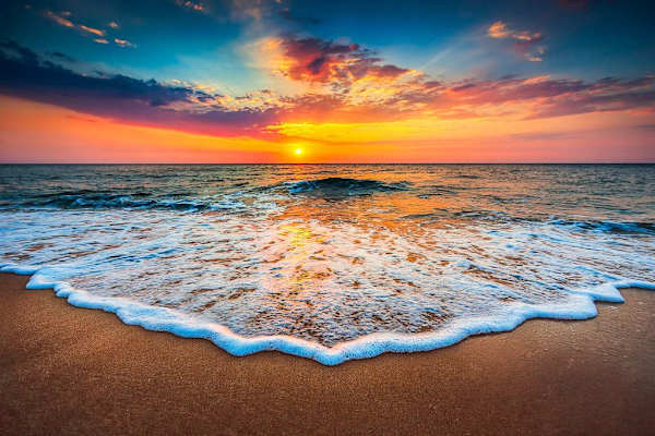 Experience Magical Hawaiian Sunsets Right From The Beach