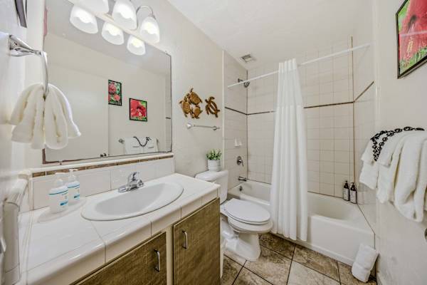 Clean, Modern Bathroom Vanity Packed With Amenities