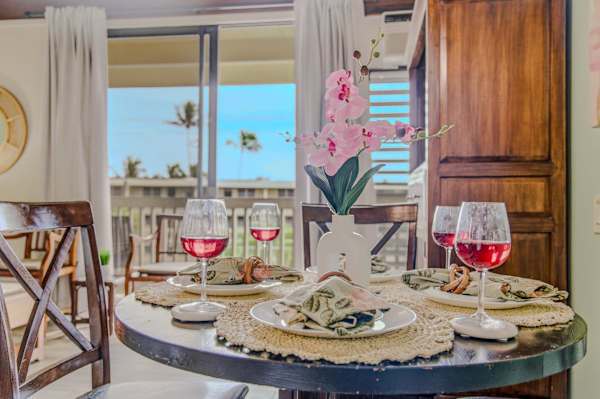 Unwind With Wine And Tropical Breezes At The Dinner Table