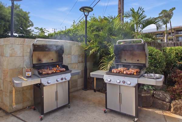 Grills Fired Up with Food Cooking
