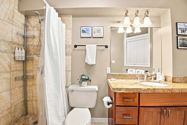 Guest Bathroom with Tile Shower and Vanity