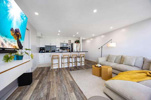 Enjoy entertainment from your living area with a 75" Smart TV with cable