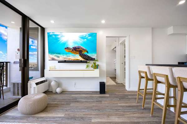 Watch your favorite shows from your 75" Smart cable TV
