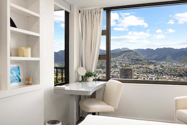 Enjoy the lush mountain view from your bedroom, and work at ease at your cute desk.