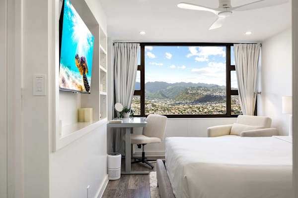 Enjoy stunning mountain views from your bedroom