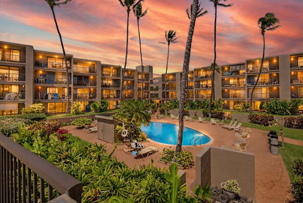 Twilight Bliss By The Resort Pool Among Swaying Palms