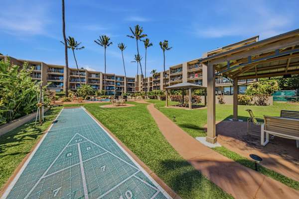 On-Site Shuffleboard In Lush Tropical Surroundings