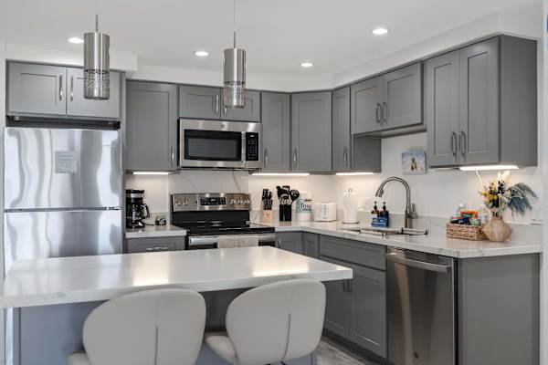 Cook, dine, and entertain effortlessly at your kitchen island with bar seating, set in a beautifully updated kitchen with stainless steel appliances.