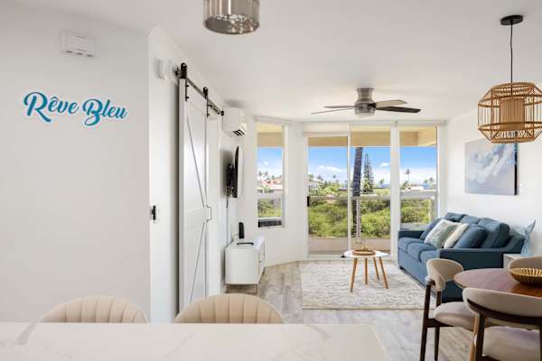Welcome to your light-filled, open-concept layout designed for effortless living with dedicated dining, cozy lounging, and serene island views.