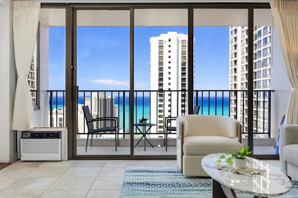 Take in stunning ocean and high-rise views from your plush indoor seating or step out onto your private balcony for front-row coastal scenery!