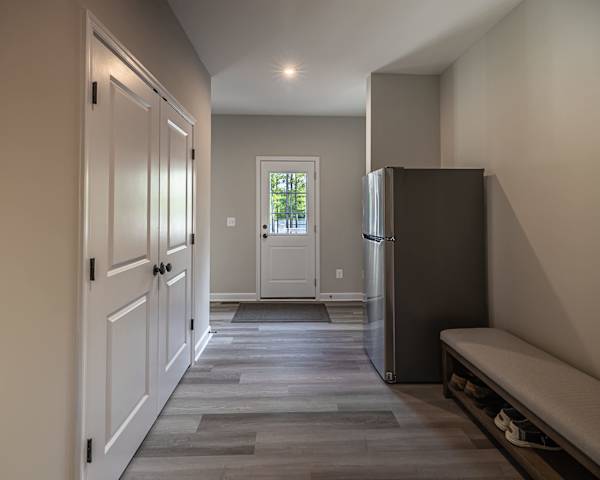 Hallway - A bright pass-through with an extra refrigerator, handy for a big group.