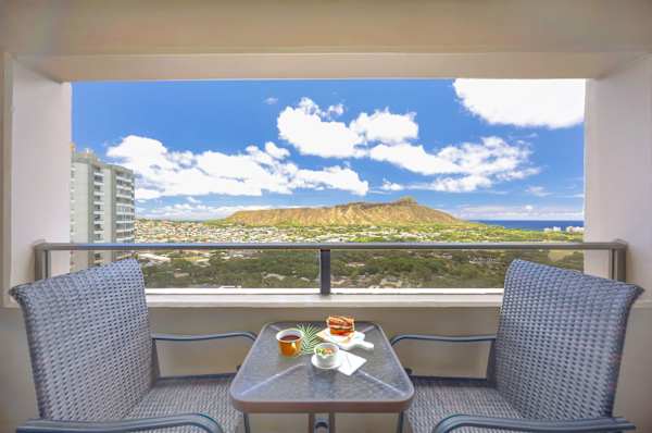 Savor your morning coffee with breathtaking, panoramic views of Diamond Head and the ocean from your private lanai.