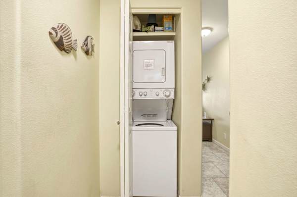 Enjoy ultimate convenience with an in-unit stacked washer and dryer, neatly tucked away in a private closet.